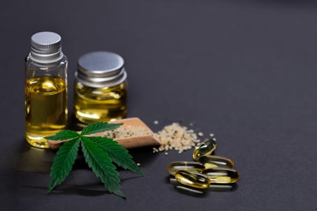 marijuana plant, CBD oils, and capsules